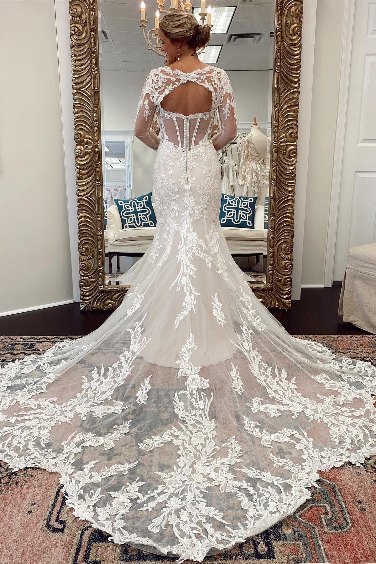 White Lace Cutout Long Sleeves Trumpet Bridal Gown